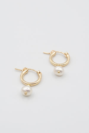 Gold hoop with pearl drop earring